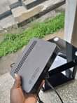 A picture of TV shelf and Gotv decoder