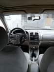 A picture of Toyota Mazda protege for sale Portharcourt Choba prescisely First body