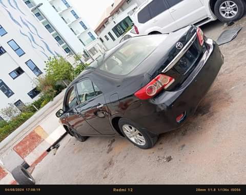 A picture of Toks Standard 2013 Toyota Corolla with full options Untampered engine