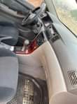 A picture of Sharp Toyota Corolla 2006 on belt