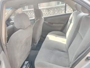A picture of Registered 04 Toyota corolla painted on first body engine and