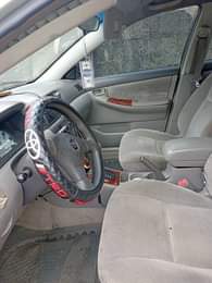 A picture of Toyota Corolla 2004 model Sound Engine Smooth gear transmission AC