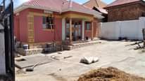 A picture of House for sale nansana kyebando 3bedrooms sitting dining kitchen apple
