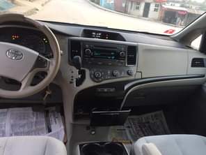 A picture of The White color Toyota sienna Model 2010 Fresh tokunbo DM