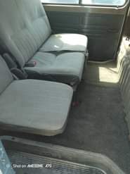A picture of Mitsubishi L300 bus with absolutely nothing to fix engine is