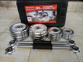 A picture of Gym equipments and dumbbells