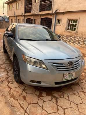 A picture of IN GOD WE TRUST Distress sales Neatly used Toyota Camry
