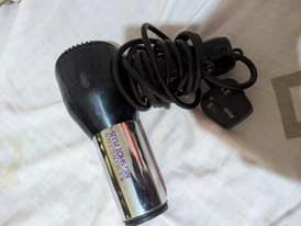 A picture of Hairdryer and hair straightener