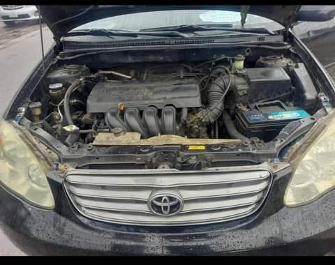 A picture of TOYOTA COROLLA 2004 ENGINE AC GEAR BODY OKAY PRICE 3M