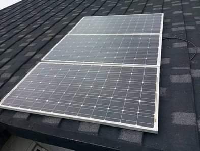 A picture of 3 panels 1 tubular battery 1 60a charge controller Battery