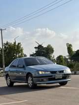 A picture of EXTREMELY CLEAN 406 MANUAL DRIVE 1 5M KADUNA EVERYTHING BLESSED