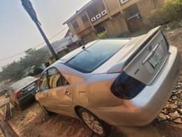 A picture of DELAY IS DANGEROUS 2004 Toyota Camry big daddy Super cool