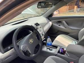 A picture of Ninja used Toyota Camry spider Partly firstbody Neatly used untouched