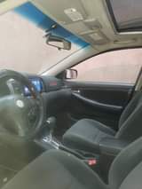 A picture of PARTIALLY FIRST BODY NIGERIA USED TOYOTA COROLLA Good engine good