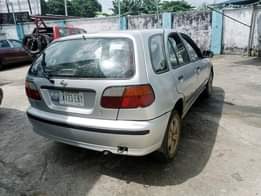 A picture of NISSAN ALMERA FIRSTBODY ALLOY PRICE 800K Settle agent 50k PORTHARCOURT