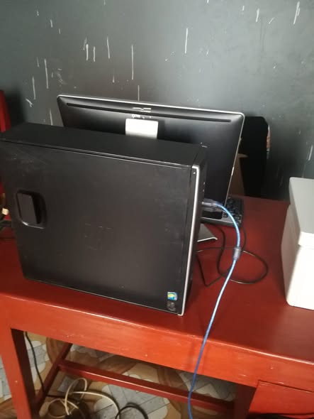 A picture of Computer printer and sumsung DVD for sale