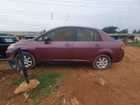 A picture of Clean Nigerian Used Nissan Tiida Repainted Fabric interior Sound four