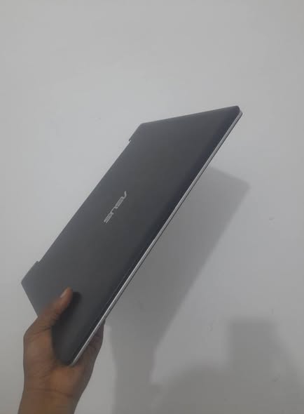 A picture of touscreen slim laptop Asus core i3