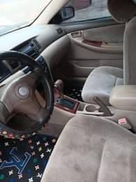 A picture of Toyota Corolla 2004 model everything is working perfectly well buy