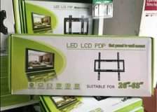A picture of Tv wall blacket Stand ndogo elfu9000 Stand kubwa elfu15000 Ya