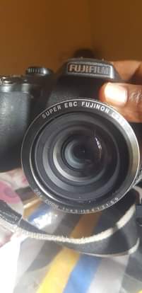 A picture of Laptop and fujifilm camera