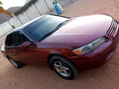 A picture of NEATLY USED TOYOTA CAMRY 2002 MODEL ENGINE AND GEAR AC