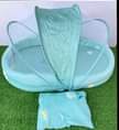 A picture of Comfortable baby bed and net