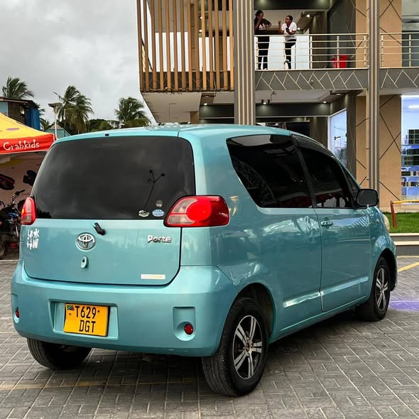 A picture of TOYOTA PORTE YEAR 2003 7 8M 2NZ 1290CC 0612889855 KIGAMBONI