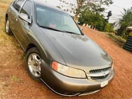 A picture of Nissan in perfect condition engine and gear is Only AC