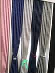 A picture of Curtains nets pipes and cushions