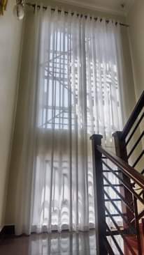 A picture of Curtains nets blinds rods and all interiors