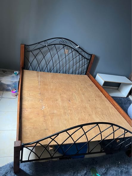 A picture of 5 6 Metalic wood bed and dressing table on sale