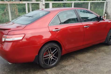 A picture of Toyota Camry 2011 Model Colour Red Low mileage Condition Nigerian