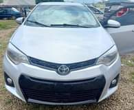 A picture of Neatly used 2014 Corolla untampered engine and gear AC chilling