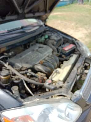 A picture of Sharp Black Toyota Corolla 2004 Not First Body Engine is