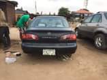 A picture of Corolla for sale the engine is tapping and no battery