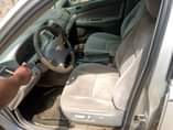 A picture of NIGERIA USED TOYOTA CAMRY 2004 model smoking engine and good