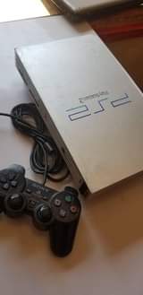 A picture of PlayStation2 with pads is available