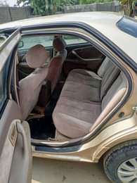 A picture of Ok Toyota Camry Tiny light Engine and gear sound Body