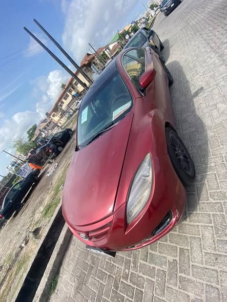 A picture of Uber standard 010 Mazda available for grab Engine n gear