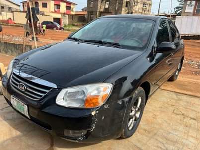 A picture of Reg Kia cerato 2008 model extremely clean engine and gear