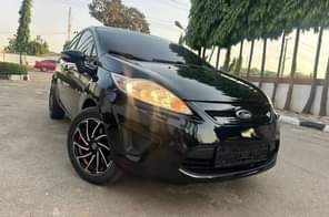 A picture of URGENT BUYERS ONLY CALL 09063948959 CLEAN FORD FIESTA SE 2013