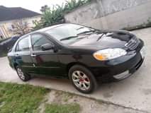 A picture of Sharp Toyota Corolla 2004 model Engine AC is iceblock Gear