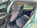 A picture of TORQUESE NIGERIAN USED PEUGEOT 407 2005 MODEL WITH ORIGINAL PAPERS