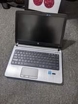 A picture of Hp 430 g2 Dell inspiron 15