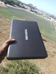 A picture of Toshiha core 7 Ram 4gb hdd 500gb procesor 2.20ghz chaji