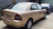 A picture of Very Clean Tokunbo TOYOTA COROLLA Excellent alloy Rims and Gold