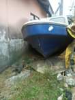 A picture of This fibre boat with the double engine 27 horsepower for