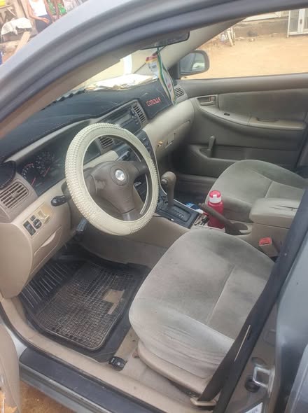 A picture of 2004 Toyota Corolla engine gear ac perfect first body price
