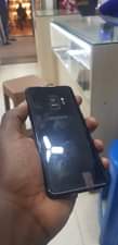 A picture of Samsung s9 64gb 4gb ram 420k call or WhatsApp 0755656909